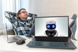 digital accomplice replacing a person with artificial intelligence. the programmer is resting, the neural network is working. happy businessman sleep relaxed in the office. graphics on the screen are are made up by the author